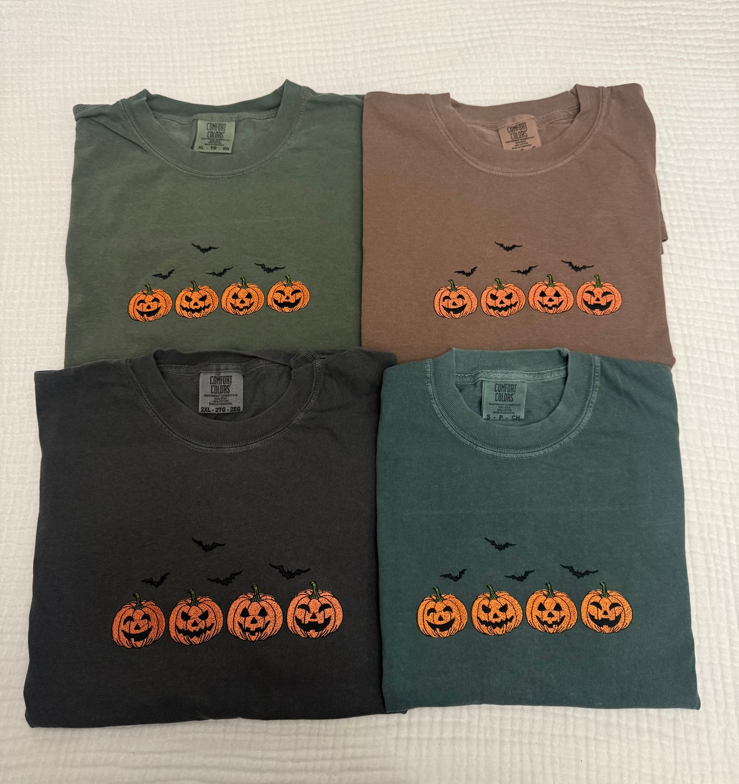 Pumpkins and bats embroidered spooky season comfort colors tee